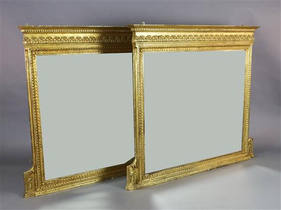 A pair of Edwardian giltwood and gesso overmantel mirrors, W.4ft 5in. H.4ft 2in.